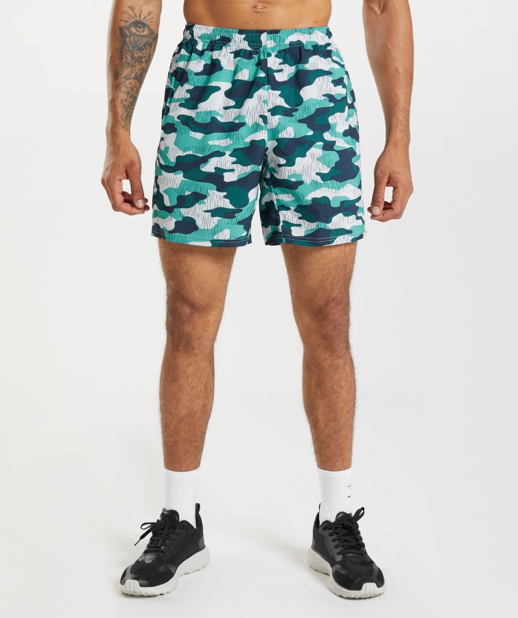Gymshark Arrival 7" Kurzer Fauna-Blaugründruck
